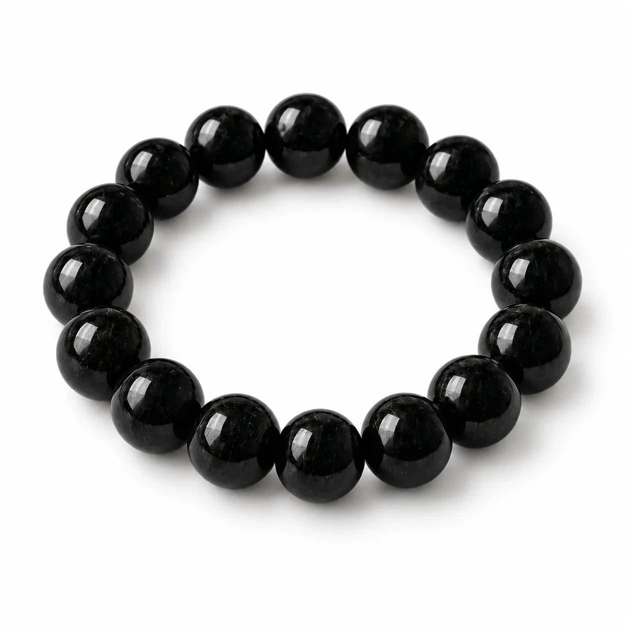 Natural Black Tourmaline Crystal Bracelet for Men & Women Online Natural Black Tourmaline Crystal Bracelet for men and women featuring polished black round gemstone beads in 8mm and 10mm sizes with a stretchable design.