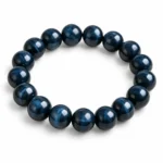 Natural Blue Tiger Eye Crystal Bracelet for men and women featuring polished blue-grey gemstone beads with a silky shimmer, available in 8mm and 10mm round beads for calmness and confidence.