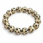Natural Dalmatian Jasper Crystal Bracelet for men and women featuring cream and beige gemstone beads with distinctive black spots, available in 8mm and 10mm round sizes.