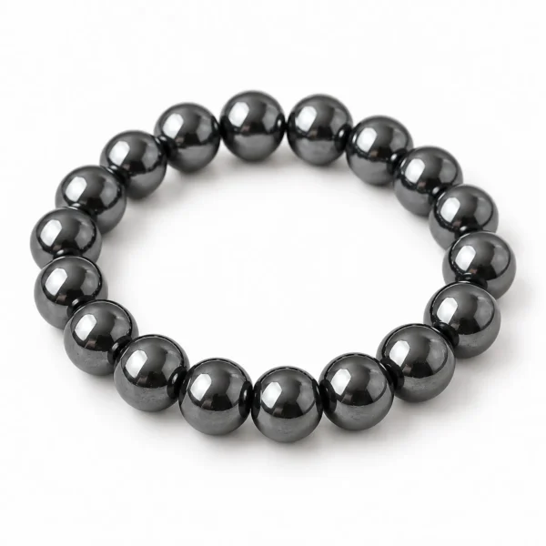Natural Hematite Crystal Bracelet for grounding and meditation featuring polished metallic-grey gemstone beads in 8mm and 10mm round sizes with a comfortable stretchable design.