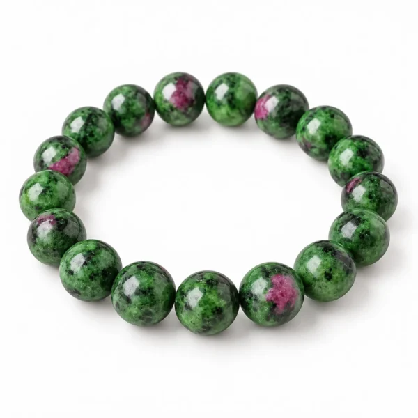 Natural Ruby Zoisite Crystal Bracelet for men and women featuring green Zoisite gemstone beads with reddish-pink Ruby inclusions and natural dark patterns, available in 8mm and 10mm round beads.
