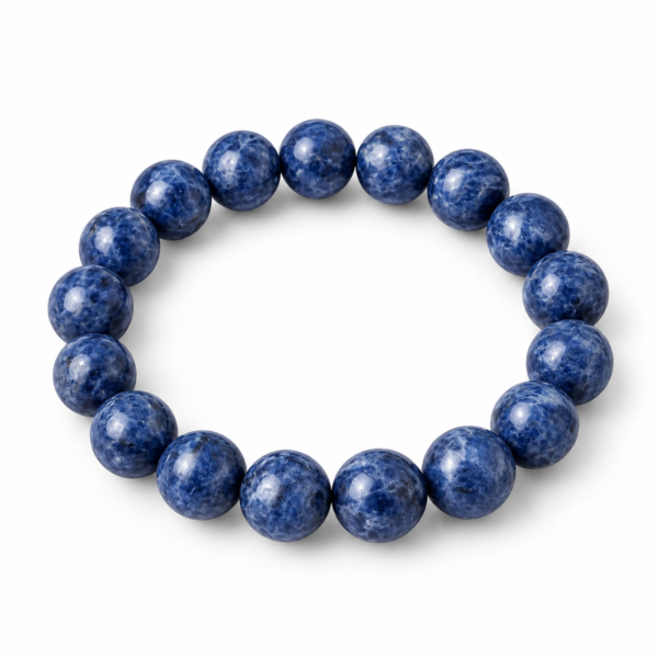 Natural Sodalite Crystal Bracelet for spiritual balance and meditation featuring polished royal blue and deep navy gemstone beads with natural white patterns in 8mm and 10mm round sizes.