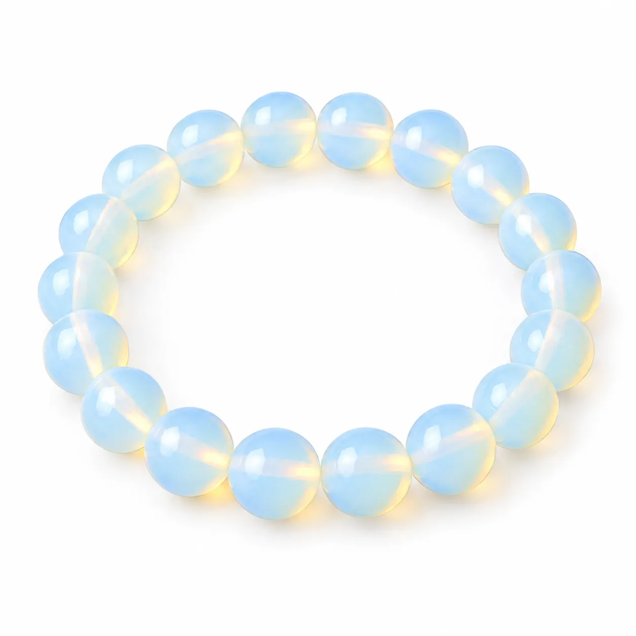 Opalite Crystal Bracelet for Calmness, Clarity & Inner Peace Opalite Crystal Bracelet for calmness, clarity and inner peace featuring polished iridescent milky-white beads with soft blue reflections, available in 8mm and 10mm round bead sizes.