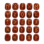 Natural red jasper rune stone with rich red colour and engraved rune design