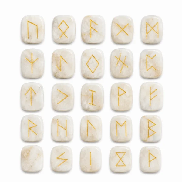 Natural moonstone rune stone with soft white sheen and engraved rune design