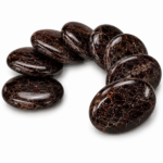Natural Garnet Palm Stone/Worry Stones in a curved circular arrangement on a white background