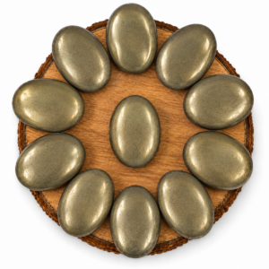 Natural Pyrite Palm Stones/Worry Stones arranged in a circle on a wooden display