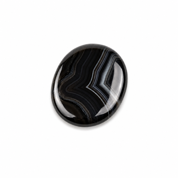 Natural Black Agate Palm Stone in oval shape with black and white banded patterns