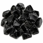 Natural black obsidian rough stone with dark volcanic colour and raw glassy texture