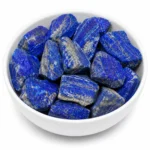 Natural lapis lazuli rough stone with deep blue colour and golden pyrite inclusions