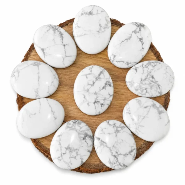 Natural howlite palm stone worry stone with white colour and grey veining