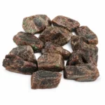 Natural garnet rough stone with rich colour and raw crystal texture