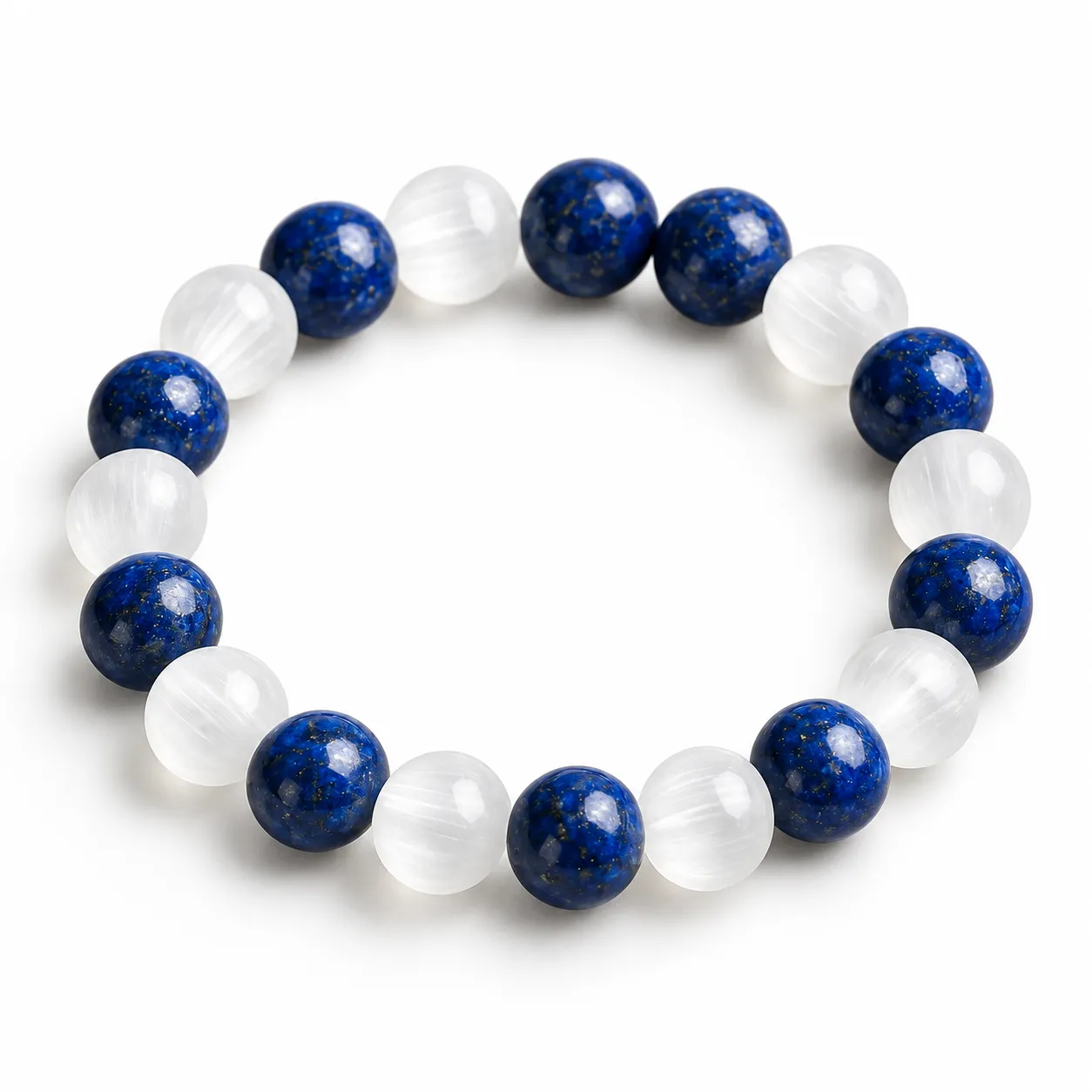Natural Meditation & Spirituality Crystal Bracelet – Lapis Lazuli & Selenite Pure Gems World Natural Meditation & Spirituality Crystal Bracelet featuring royal-blue Lapis Lazuli and white Selenite round gemstone beads in 8mm and 10mm sizes.