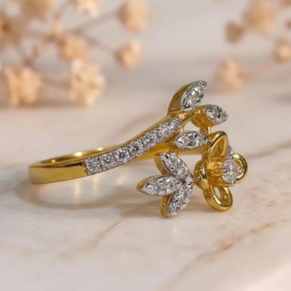 Gold flower and leaf diamond cocktail ring with elegant floral design and sparkling diamond accents