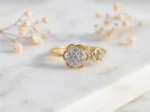 Bloom & Bud diamond ring in gold featuring a floral cluster design with sparkling diamonds and an elegant open band