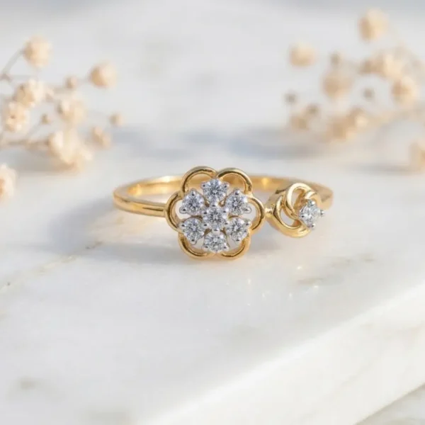 Bloom & Bud diamond ring in gold featuring a floral cluster design with sparkling diamonds and an elegant open band