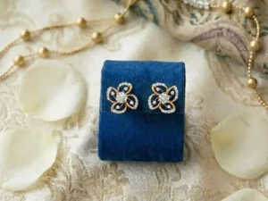 Blossom Diamond Stud Earrings featuring floral-inspired diamond motifs with elegant sparkle.