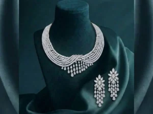 Diamond Draped Cascade Necklace Set featuring layered cascading diamonds with matching earrings in an elegant statement design.
