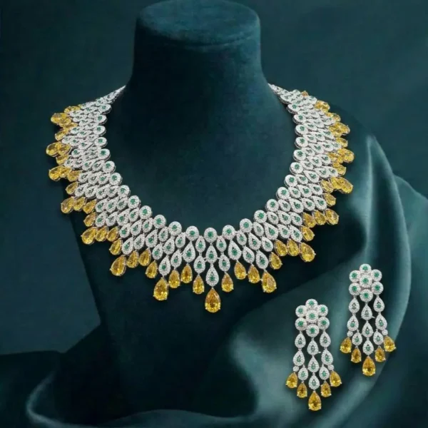 Golden Teardrop Cascade Diamond Necklace Set featuring cascading teardrop-shaped CVD diamonds with matching earrings in a luxurious design.