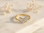 Heart cluster diamond ring in gold featuring a sparkling heart-shaped diamond arrangement