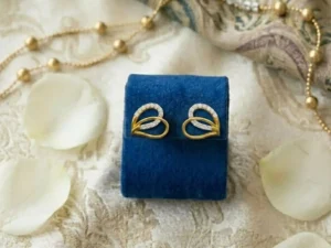 Heart Diamond Earrings featuring heart-shaped diamond designs with elegant sparkle.