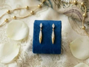 Marquise Diamond Drop Earrings featuring elegant marquise-cut diamonds in a graceful drop design.