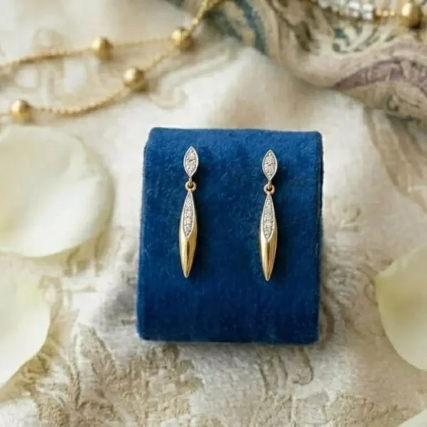 Marquise Diamond Drop Earrings featuring elegant marquise-cut diamonds in a graceful drop design.