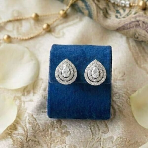 Pear Shape Double Halo Diamond Stud featuring a pear-shaped center stone surrounded by sparkling double halo diamonds.