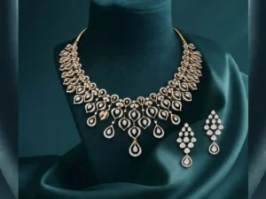 Royal Cascade Teardrop Diamond Necklace Set featuring cascading teardrop-shaped lab-grown diamonds with matching earrings in an elegant bridal jewelry design.