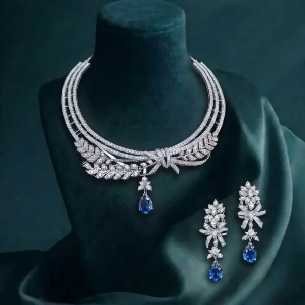 Sapphire Leaf Elegance CVD Diamond Necklace Set featuring leaf-inspired sapphire accents with sparkling lab-grown diamonds and matching earrings.