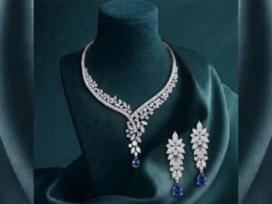 Vine Elegance Diamond Necklace Set featuring sapphire-inspired vine patterns with sparkling diamonds and matching earrings.