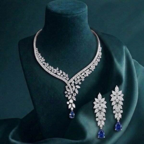 Vine Elegance Diamond Necklace Set featuring sapphire-inspired vine patterns with sparkling diamonds and matching earrings.
