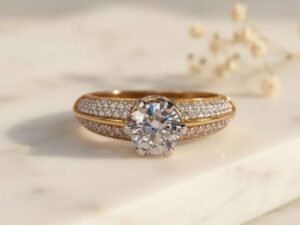 Split Shank Pavé Solitaire Ring featuring a sparkling solitaire diamond with a pavé-set split shank band.