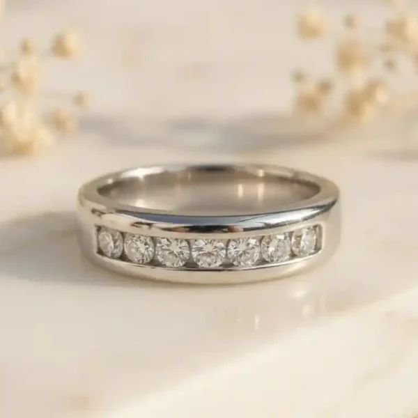 Elegant diamond band ring with a timeless design and brilliant sparkle for everyday wear or special occasions.