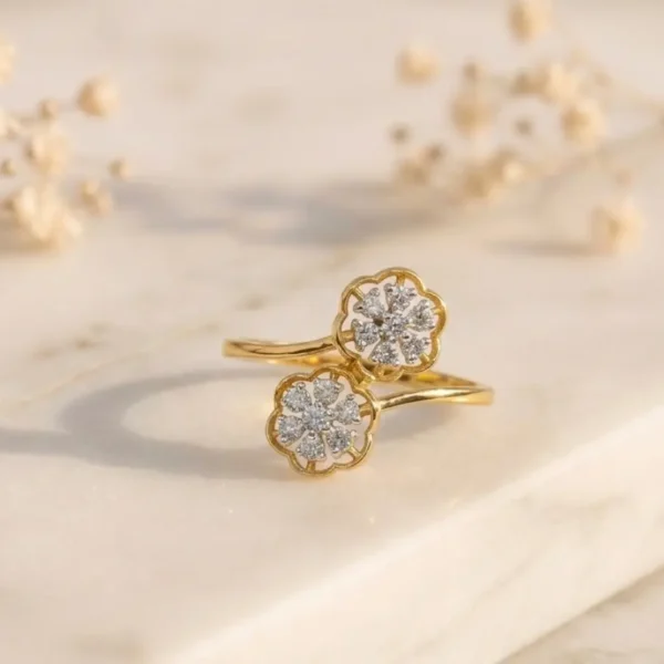 Twin floral cluster diamond open ring in gold featuring two sparkling flower-shaped diamond settings on an adjustable band