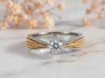 Vintage Beaded Solitaire Diamond Ring featuring a sparkling solitaire diamond with intricate beaded detailing.