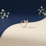 Serene Wing Nose Pin with diamond detailing shown in front, side, top, and angled views on a clean background