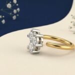 Front view of three stone diamond nose ring elegant design
