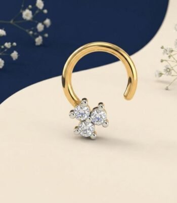 Front view of three stone diamond nose ring elegant design