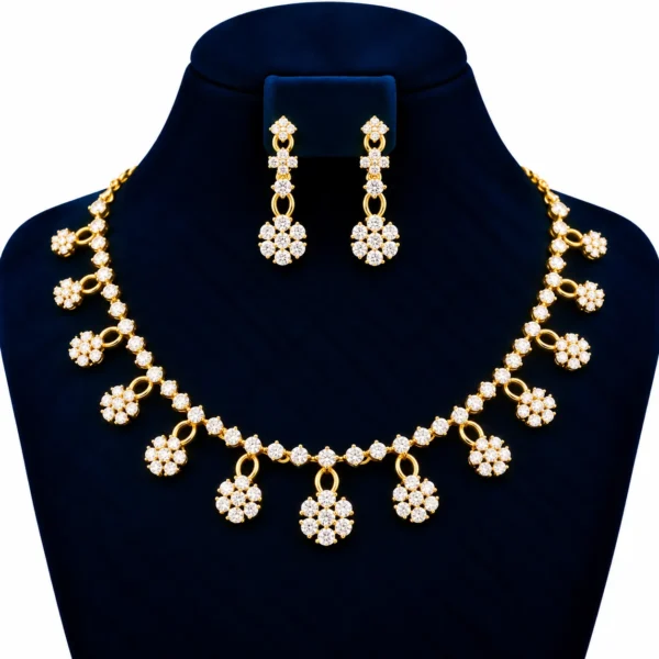 18K gold floral cluster lab grown diamond necklace set with dangling flower motifs and matching drop earrings displayed on navy blue jewellery bust