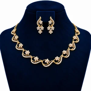 Yellow gold floral wave lab grown diamond necklace set with round diamond flower motifs and matching floral drop earrings on navy blue display