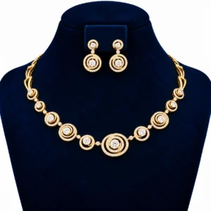 Yellow gold radiant circle lab grown diamond necklace set with concentric diamond motifs and matching circular drop earrings on navy blue display