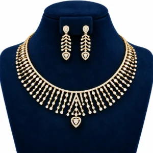 18K gold lab grown diamond necklace set with cascading diamond strands, pear-shaped centre drop and matching earrings
