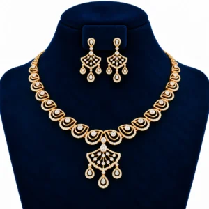 Yellow gold royal teardrop lab grown diamond necklace set with fan-shaped centre pendant and matching chandelier earrings on navy blue display