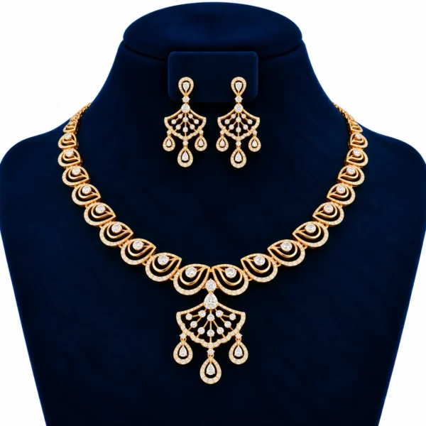 Yellow gold royal teardrop lab grown diamond necklace set with fan-shaped centre pendant and matching chandelier earrings on navy blue display