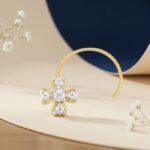 Cross flower diamond nose ring showing front, side, top and angled views with sparkling floral design
