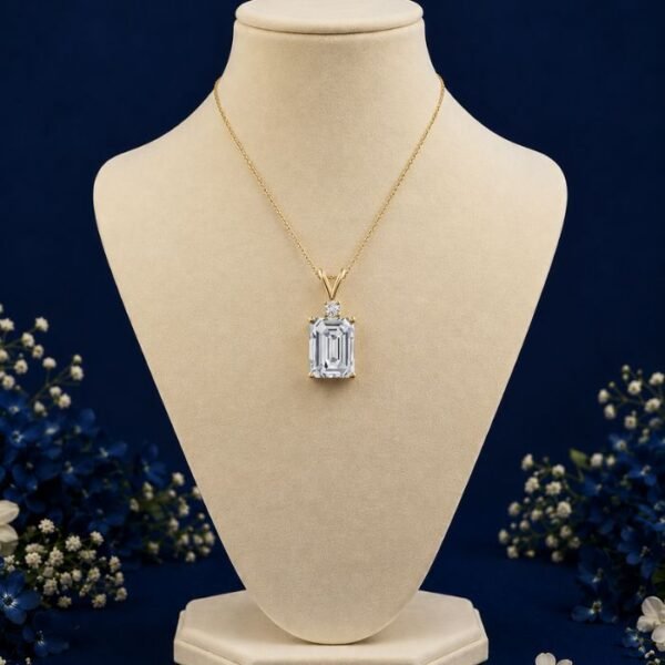 Front view of classic emerald cut lab grown diamond pendant with elegant sparkle