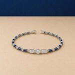 Art Deco style lab-grown diamond and blue sapphire bracelet in white gold setting.
