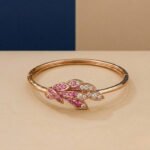A rose gold diamond vine bracelet featuring a woven lattice of lab-grown diamonds on a neutral background.