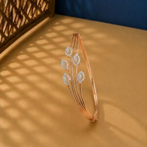 A rose gold diamond vine bracelet featuring a triple-strand stem and five marquise-shaped diamond clusters on a neutral background.